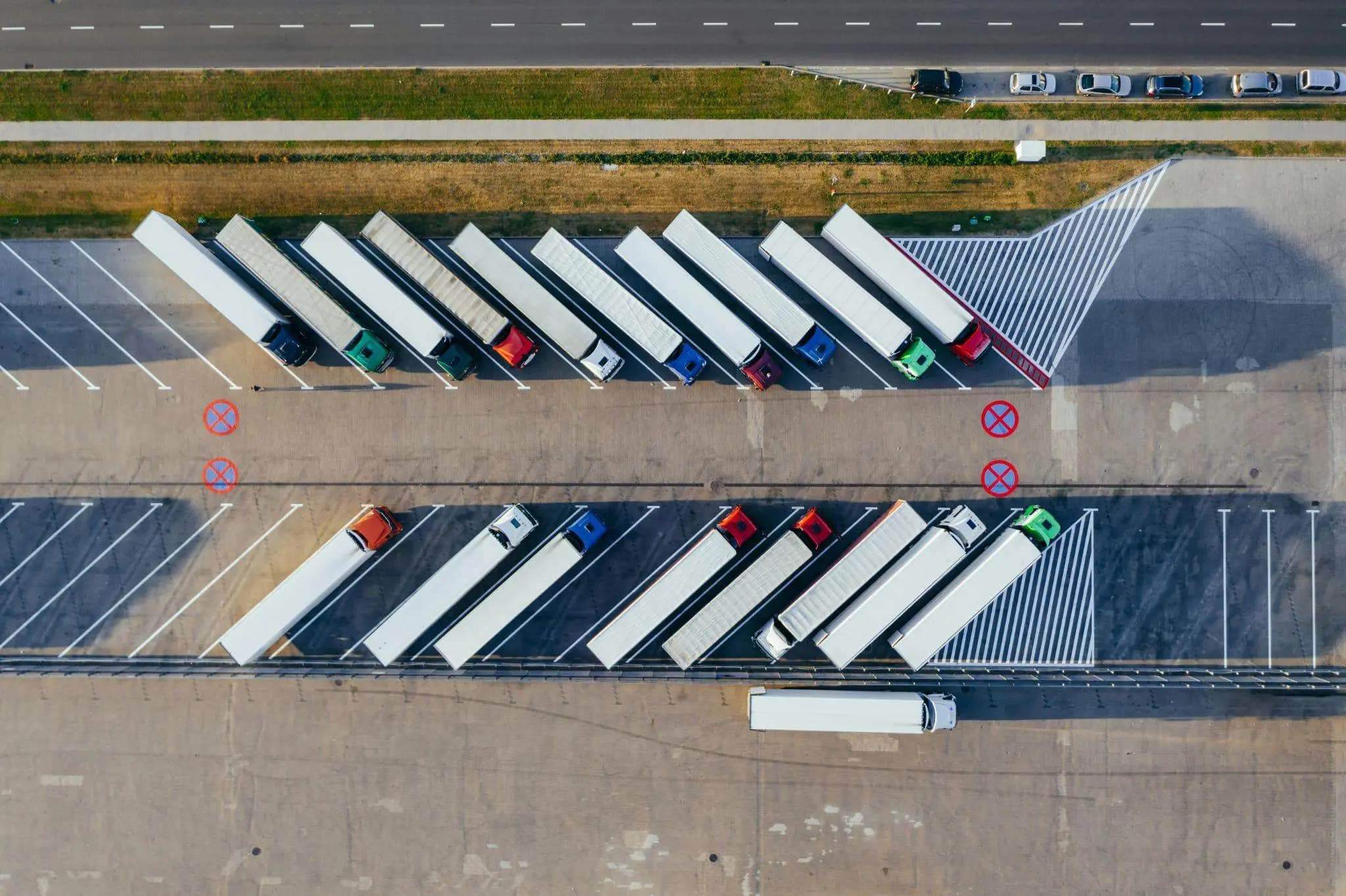 Distribution facility with multiple goods transport vehicles